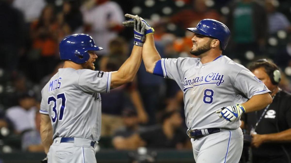 Kansas City Royals third baseman Mike Moustakas celebrated his home run against the Detroit Tigers with Brandon Moss in the 12th inning of Monday’s game in Detroit.