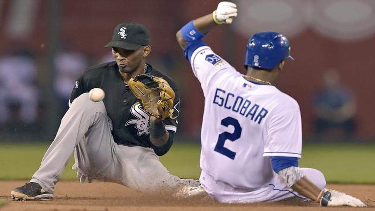 
Royals shorstop Alcides Escobar stole second before the throw to Chicago White Sox shortstop Alexei Ramirez in a game in May.

