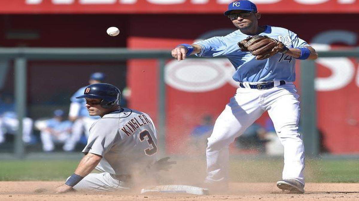 
Royals second baseman Omar Infante turned a double play over Detroit’s Ian Kinsler in a game last September at Kauffman Stadium.
