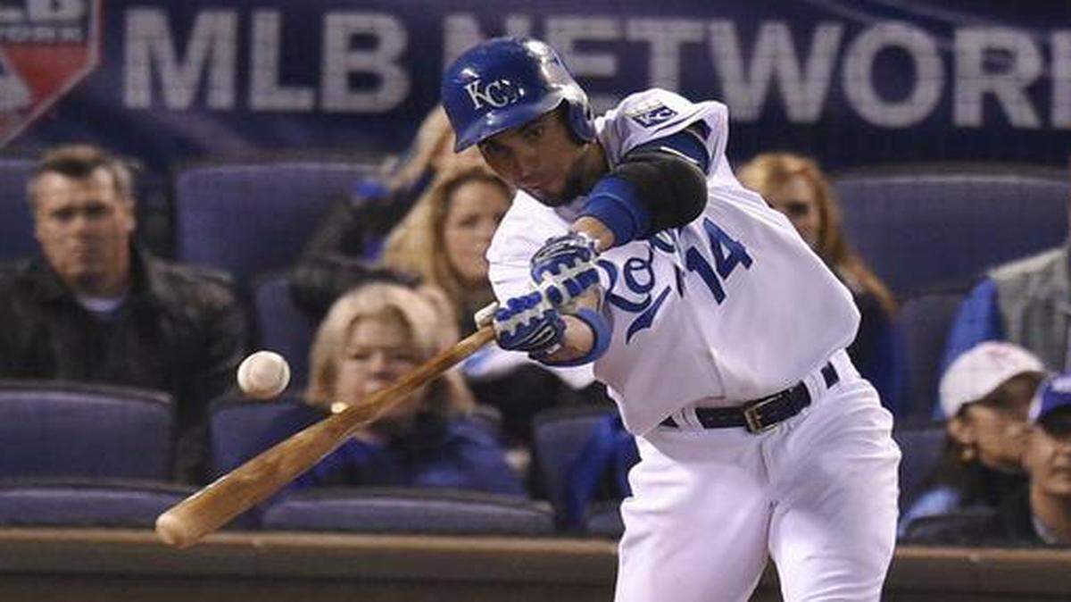 
Kansas City Royals second baseman Omar Infante got a hit against San Francisco Giants starting pitcher Madison Bumgarner during the fifth inning in game seven of the World Series on Oct. 29, 2014, at Kauffman Stadium. Infante said he has a sore elbow, but manager Ned Yost said he’s not worried about Infante’s condition.
