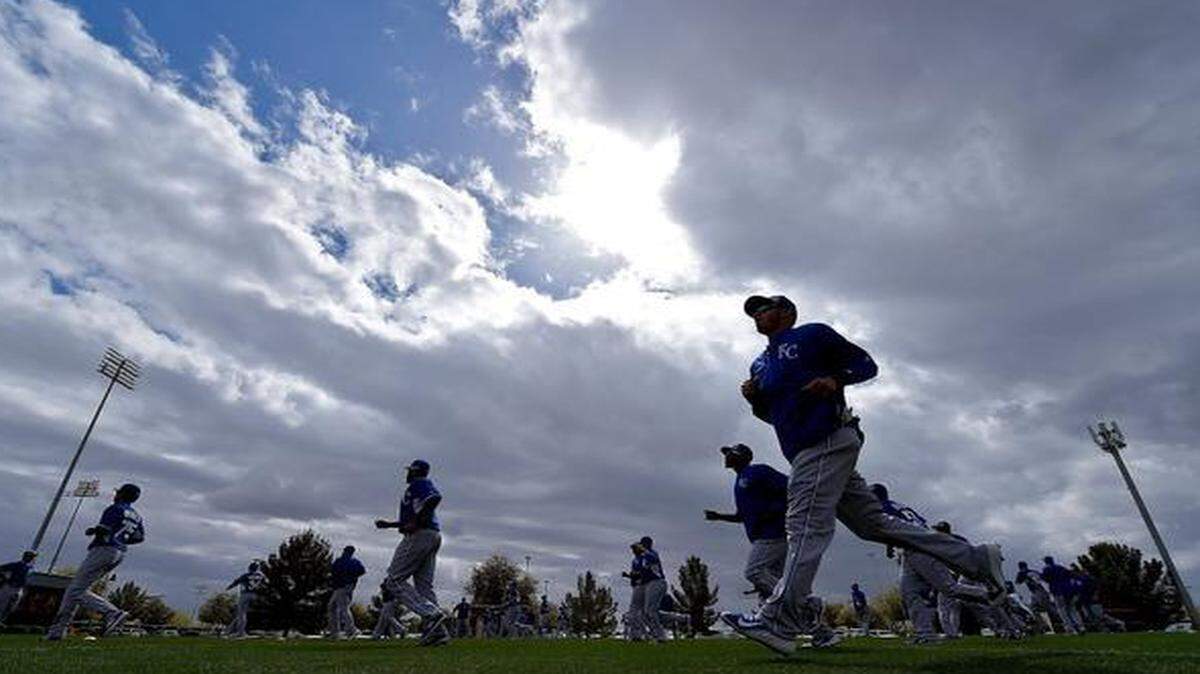 
A break in the rain gave the Kansas City Royals a chance to run, throw and hit in the batting cages in a shortened workout Saturday at spring training in Surprise, Ariz.
