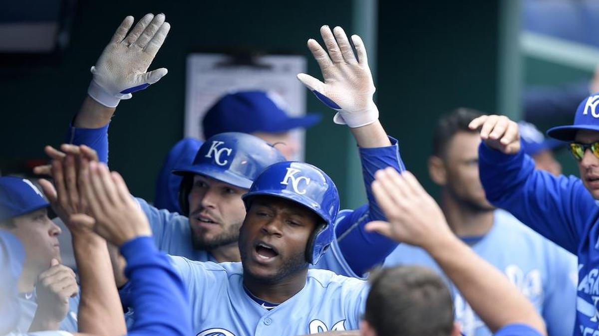 
The Royals' Lorenzo Cain (6) and Eric Hosmer (35) celebrate after scoring on a double by Kendrys Morales in the eighth inning to take the lead during last Sunday's baseball game against the Athletics at Kauffman Stadium.
