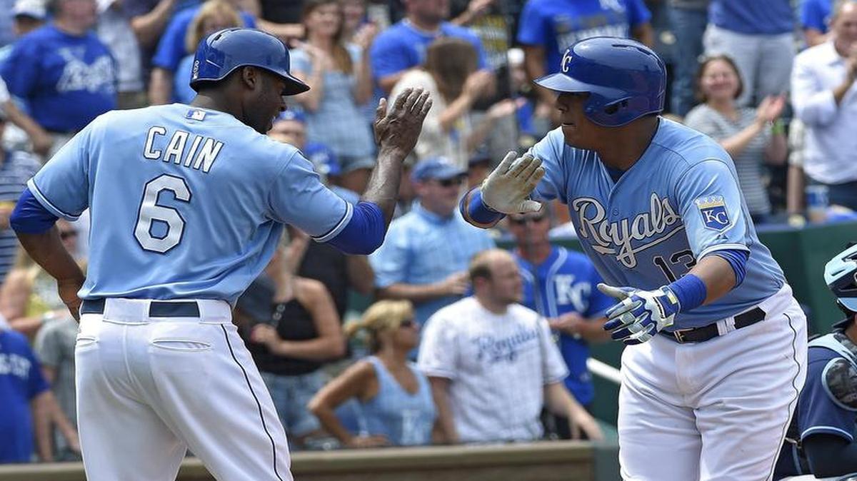 
The Royals' Lorenzo Cain (6) congratulates Salvador Perez after his two-run homer Thursday against the Tampa Bay Rays at Kauffman Stadium. Perez and
