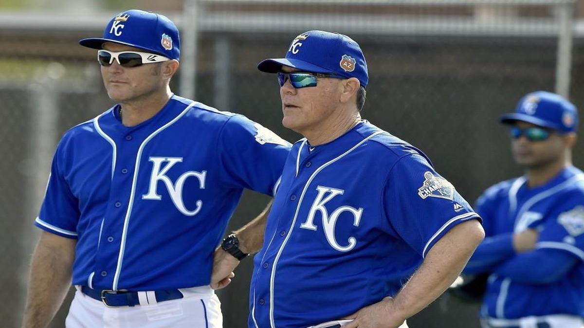 Kansas City Royals manager Ned Yost and former first baseman Mike Sweeney may have been discussing hair cuts when they watched a spring training workout on Feb. 23.