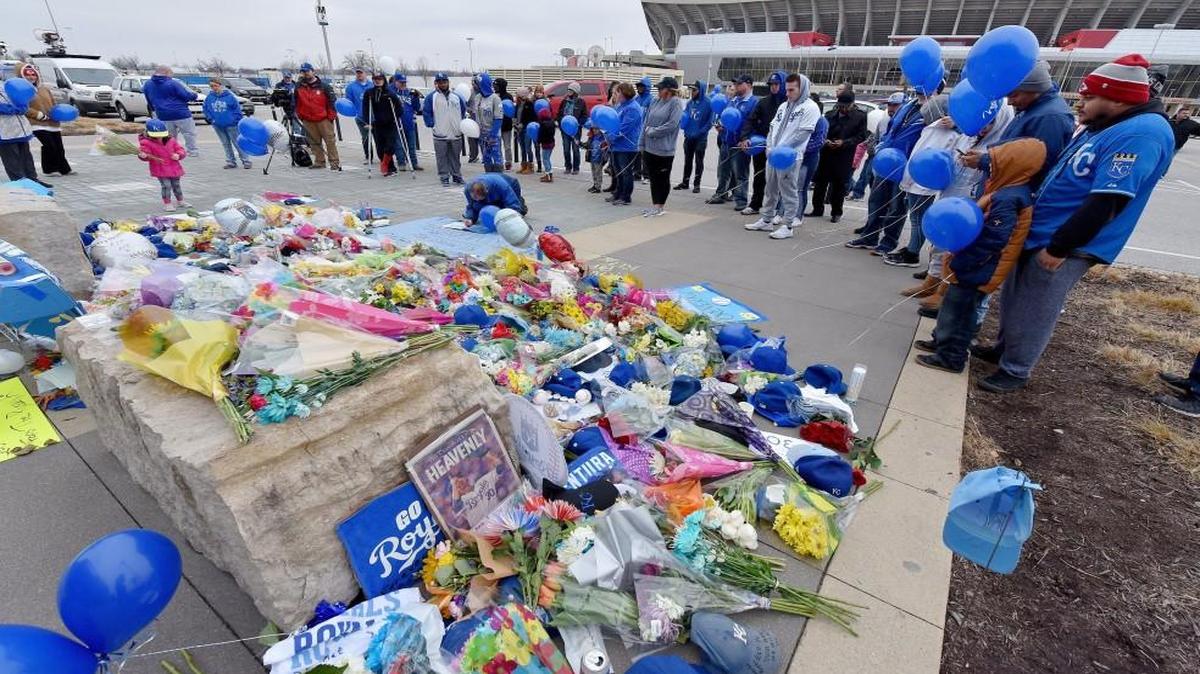 Fans gathered to release balloons at a memorial outside Kauffman Stadium on Sunday.
