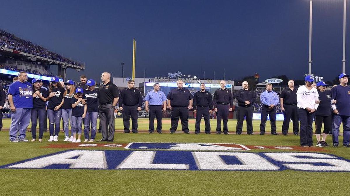 
Family members of Kansas City firefighters Larry J. Leggio and John V. Mesh were on the field during a ceremony before Wednesday’s ALDS Game 5 at Kauffman Stadium. Leggio and Mesh were killed while fighting a fire Monday night.
