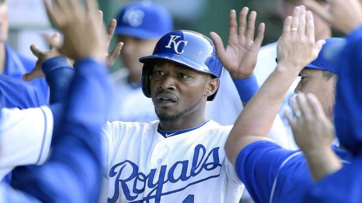 
The Royals’ Jarrod Dyson was greeted in the dugout after scoring on a grounder by Salvador Perez in the first inning.
