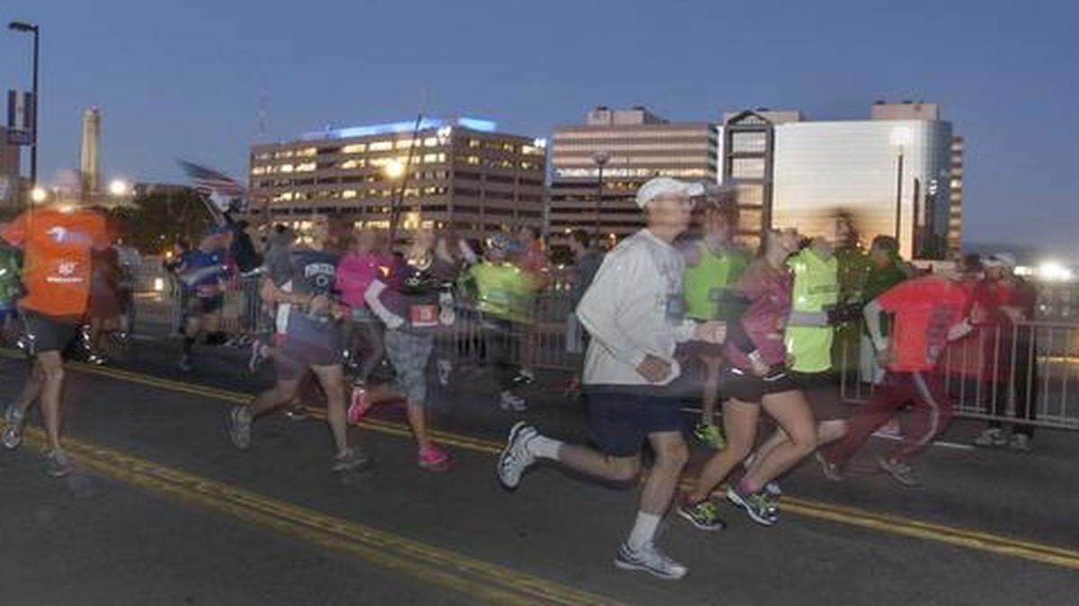 
As the sun was rising, an estimated 10,000 runners on Oct. 18 filled the streets of Kansas City for the 2014 Waddell & Reed Kansas City Marathon. The event included a marathon, a half marathon, a 5k and a kids run.
