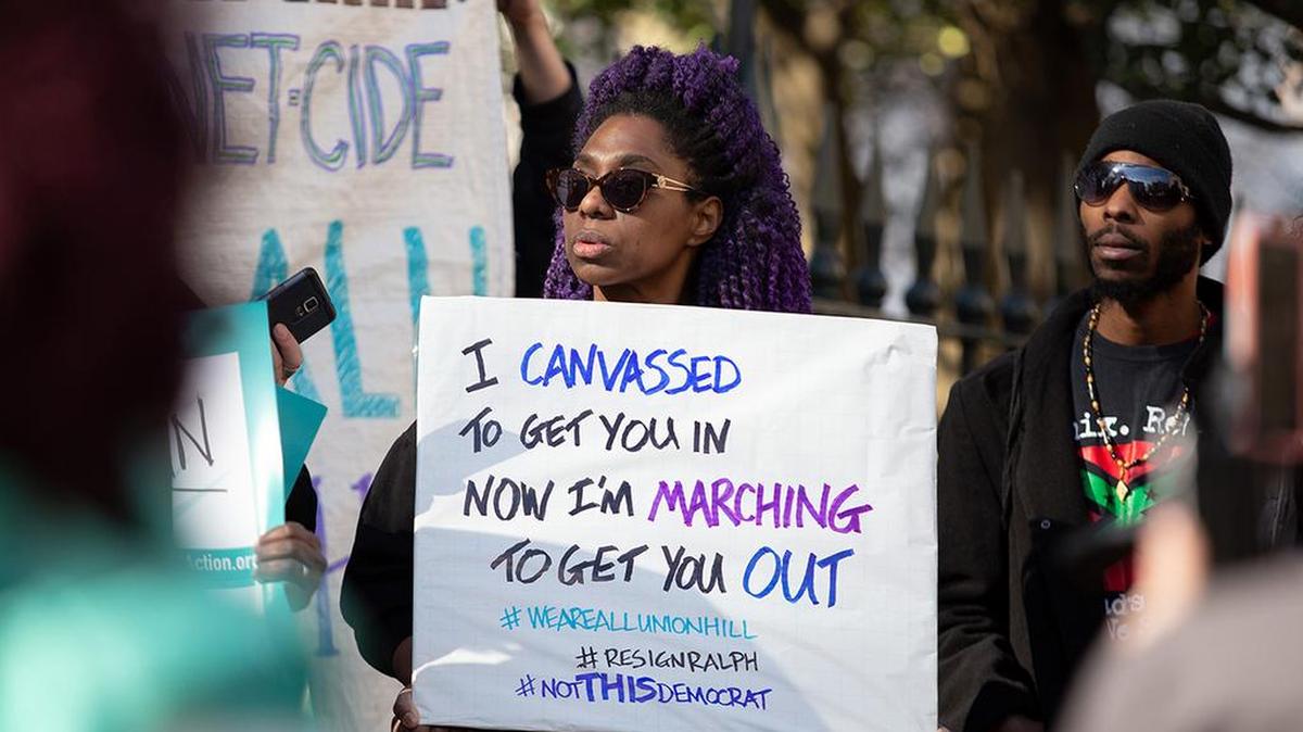 Demonstrators gather outside the governor’s mansion in Richmond, Virginia, Feb. 4, 2019.
