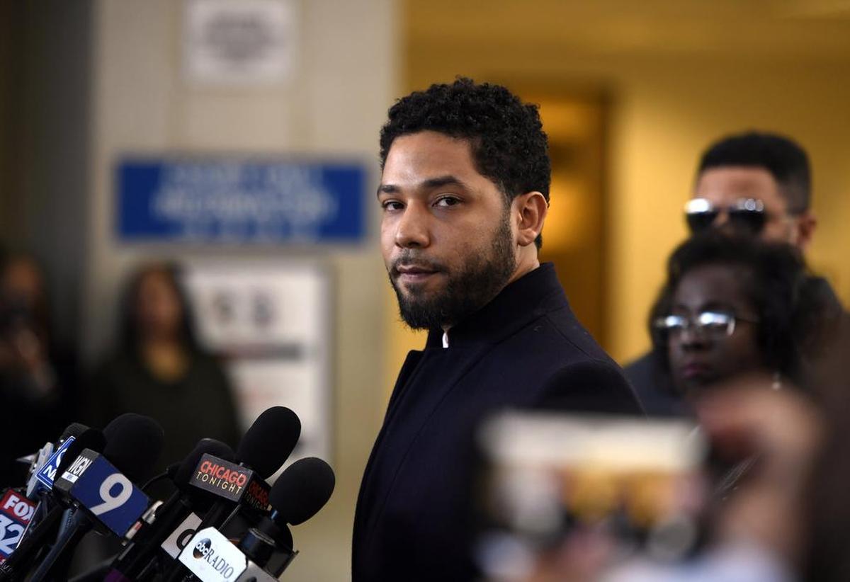 FILE - In this March 26, 2019 file photo, Actor Jussie Smollett talks to the media before leaving Cook County Court after his charges were dropped, in Chicago. Chicago’s top prosecutor has released 2,000 documents in the Jussie Smollett’s case and explained she recused herself from an investigation into his claim he’d been the target of a racist, anti-gay attack solely because of false rumors she was related to the “Empire” actor. The Friday, May 31, 2019 statement from Cook County State’s Attorney Kim Foxx came two months after her office’s suddenly dropped all charges against Smollett that accused him of staging the attack on himself. (AP Photo/Paul Beaty, File)