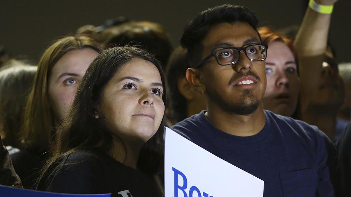 Supporters of Democratic presidential candidate Sen. Bernie Sanders, I-Vt., listen to the candidate speak during a campaign rally Thursday, March 5, 2020, in Phoenix. (AP Photo/Ross D. Franklin)