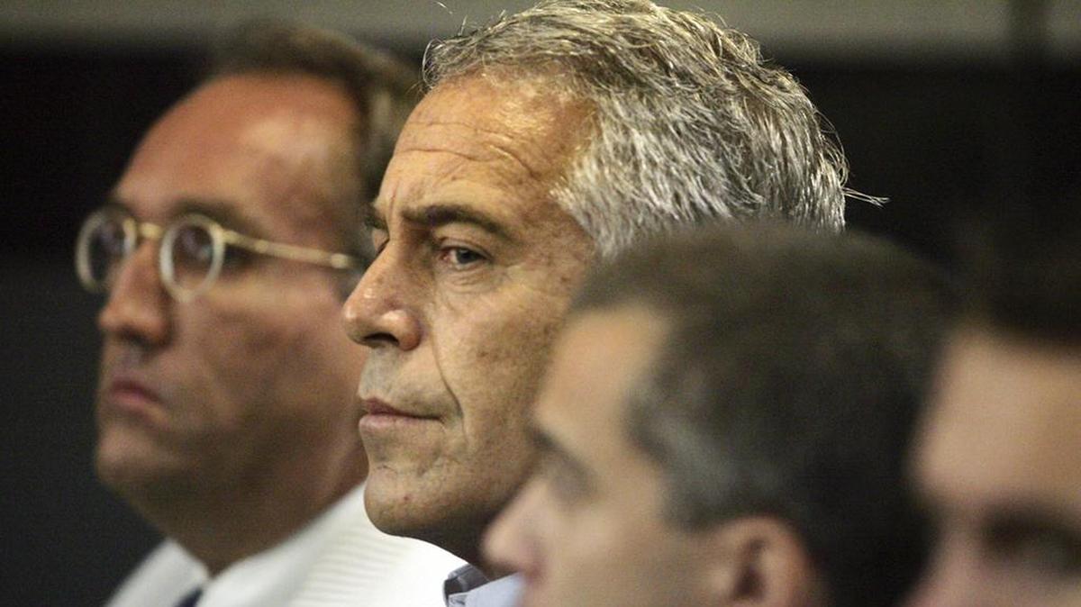 In this July 30, 2008, file photo, Jeffrey Epstein appears in custody in West Palm Beach, Fla. The wealthy, well-connected financier is accused of sexually abusing dozens of teenage girls.