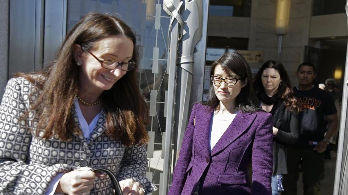 
Ellen Pao (center) left court in February during a trial of a sexual discrimination case she had brought against her previous employer. Pao recently resigned as CEO of Reddit, a social media site.
