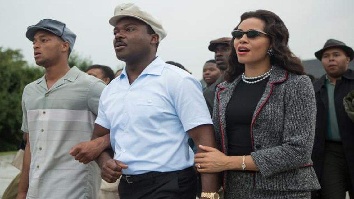 
This photo released by Paramount Pictures shows David Oyelowo, center, as Martin Luther King, Jr. and Carmen Ejogo, right, as Coretta Scott King in the film, “Selma,” from Paramount Pictures and Pathé. The civil rights march drama is up for eight NAACP Image Awards, but its historical accuracy is up for debate.
