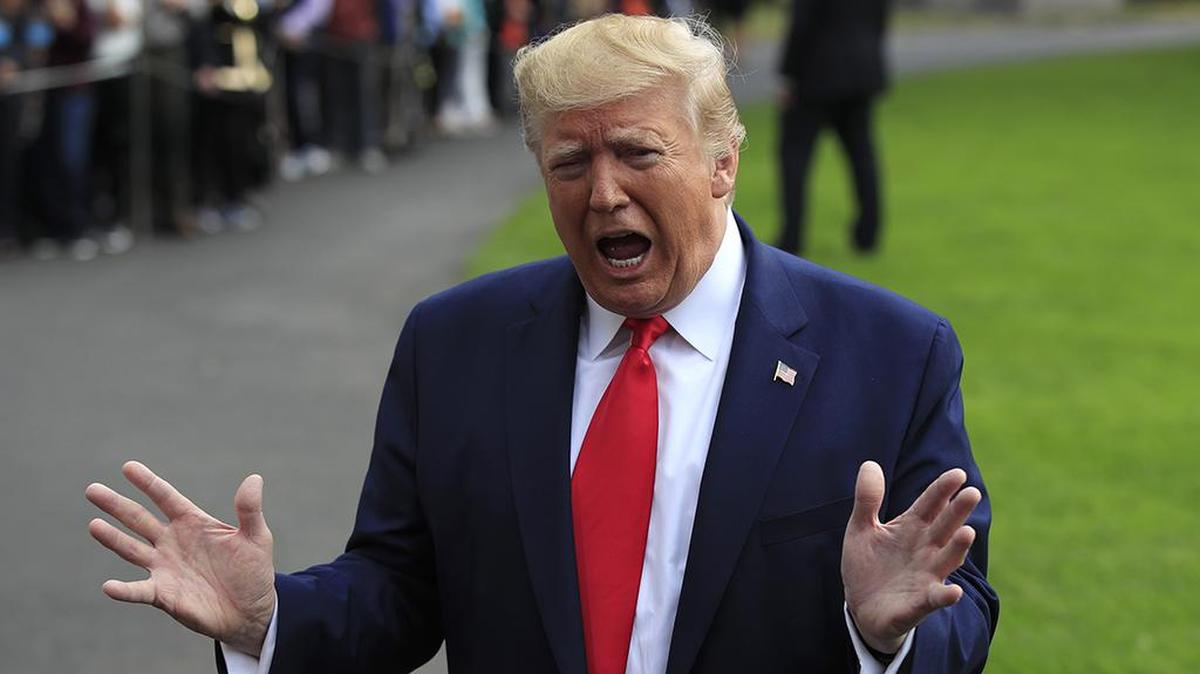 President Donald Trump speaks to reporters as leaves the White House, Friday, Oct. 25, 2019 in Washington, to travel to South Carolina. (AP Photo/Manuel Balce Ceneta)