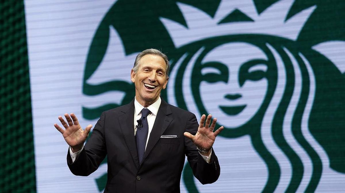 Starbucks CEO Howard Schultz speaks at a 2017 Starbucks shareholders meeting in Seattle.