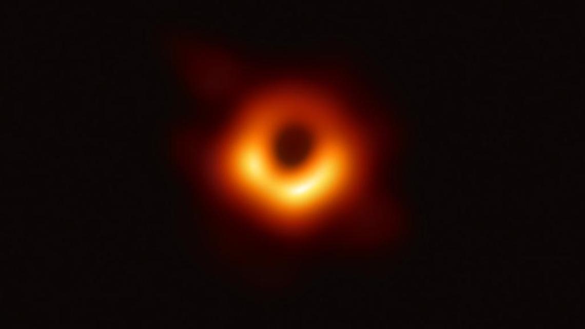 Researchers unveiled the first direct visual evidence of a supermassive black hole and its shadow. This black hole resides 55 million light years from Earth and has a mass 6.5 billion times that of the sun.