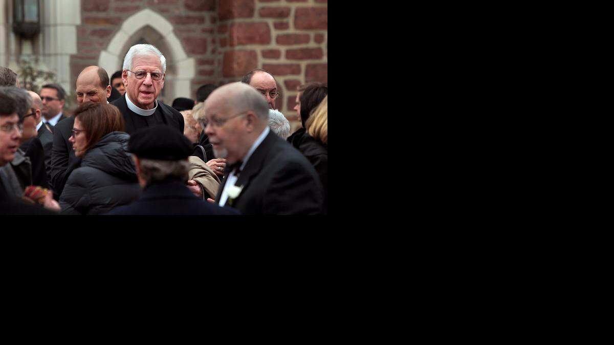 
Former U.S. Sen. John Danforth leaves The Church of St. Michael and St. George in Clayton, Mo., on Tuesday after delivering the eulogy at the funeral for Missouri State Auditor Tom Schweich.
