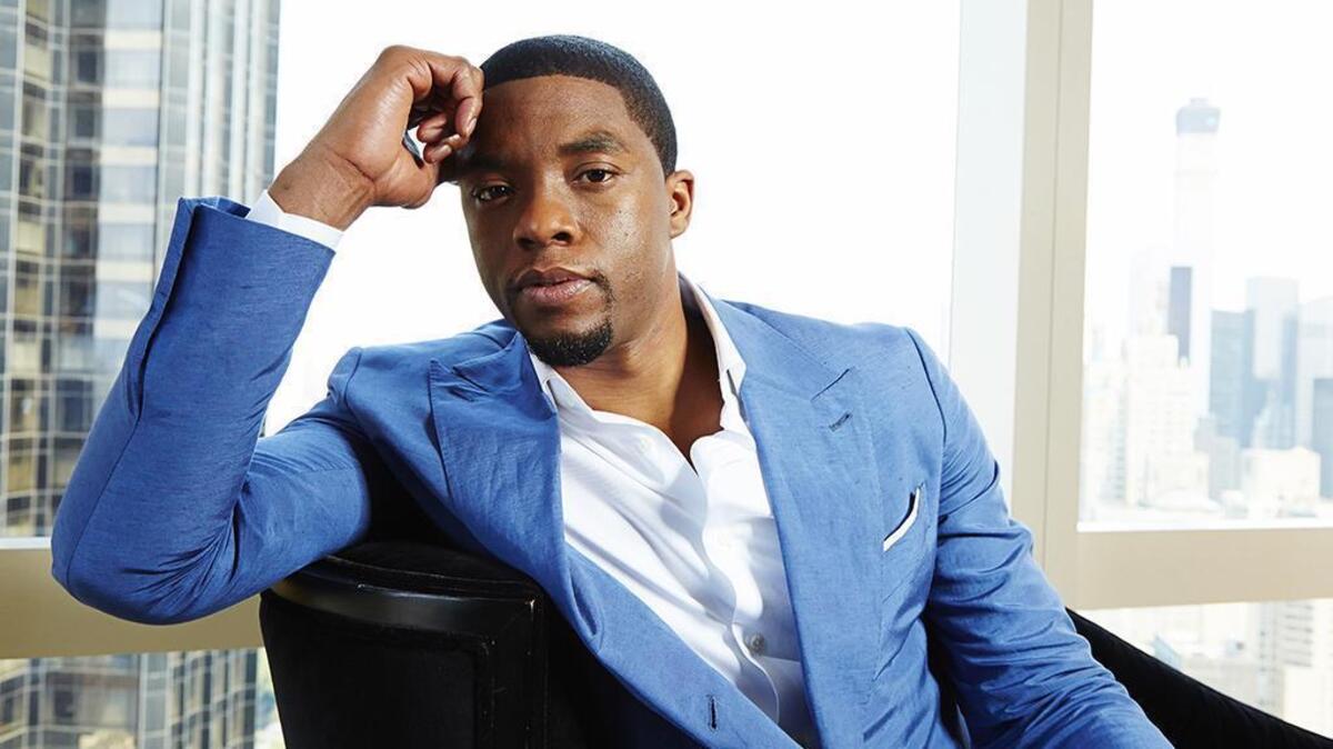 FILE - This July 21, 2014 file photo shows actor Chadwick Boseman posing for a portrait in New York. Boseman, who played Black icons Jackie Robinson and James Brown before finding fame as the regal Black Panther in the Marvel cinematic universe, has died of cancer. His representative says Boseman died Friday, Aug. 28, 2020 in Los Angeles after a four-year battle with colon cancer. He was 43. (Photo by Dan Hallman/Invision/AP, File)