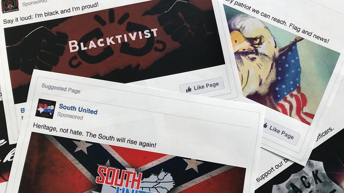 This photo shows prints of some of the Facebook ads linked to a Russian effort to disrupt the American political process and stir up tensions around divisive social issues, released by members of the U.S. House Intelligence Committee.