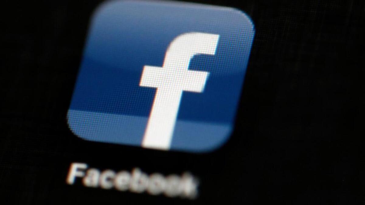 FILE - In this May 16, 2012, file photo, the Facebook logo is displayed on an iPad in Philadelphia. Facebook said it has uncovered â€œsophisticatedâ€ efforts, possibly linked to Russia, to influence U.S. politics on its platforms. The company said it removed more than 30 accounts from Facebook and Instagram because they were involved in â€œcoordinatedâ€ behavior and appeared to be fake. (AP Photo/Matt Rourke, File)