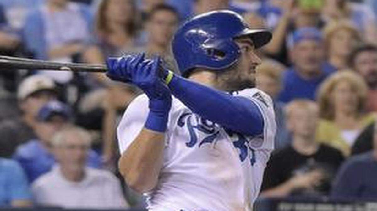 
The Royals' Eric Hosmer follows through on an RBI single in the ninth inning of Tuesday's baseball game against the Twins on at Kauffman Stadium.
