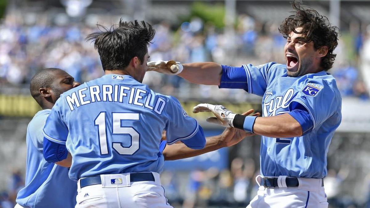 The Royals’ Brett Eibner celebrated with Lorenzo Cain and Whit Merrifield after his game-winning hit completed a crazy comeback 8-7 win last month.