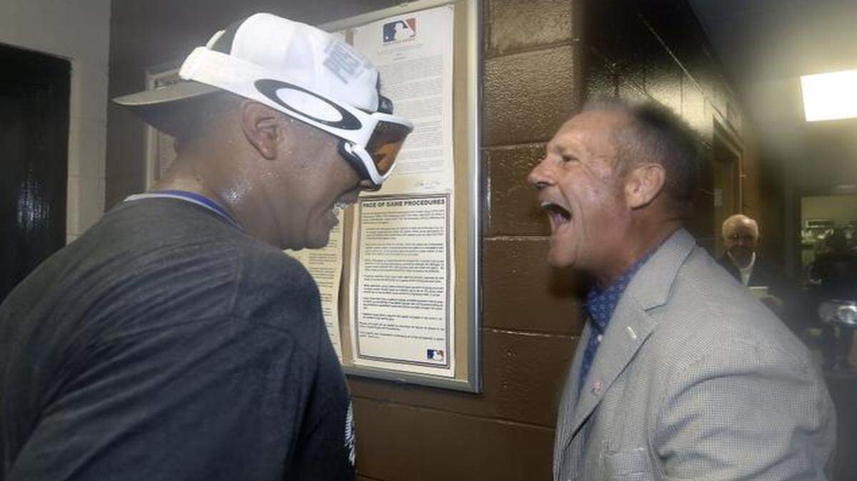 
Salvador Perez was congratulated by George Brett on Friday after the Royals clinched a playoff berth.
