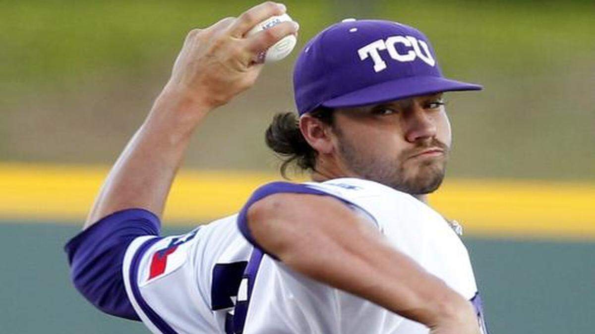 
TCU pitcher Brandon Finnegan was drafted by the Royals with their first pick, No. 17 overall.
