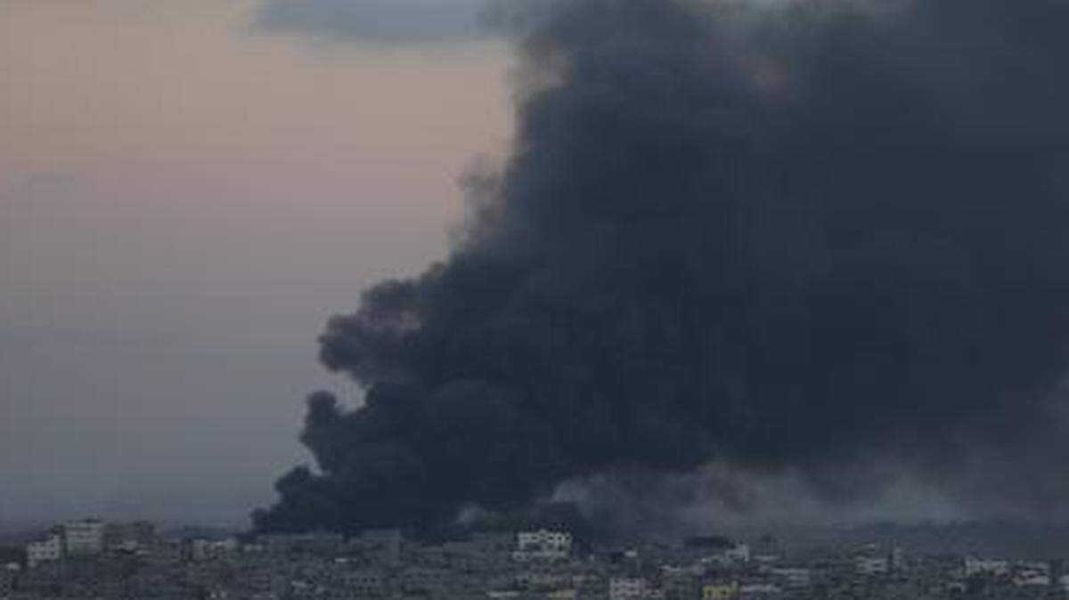 
Smoke from an Israeli strike rises over Gaza City on July 25. 
