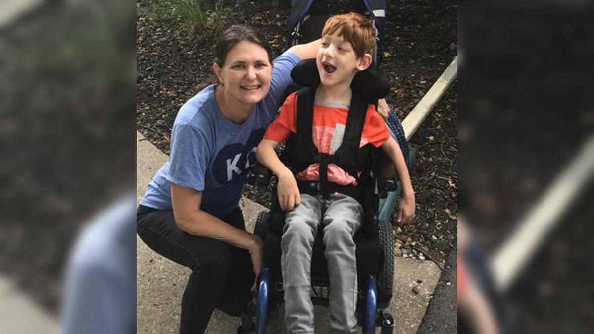Prairie Village’s Laura Robeson, left, with her son Danny.