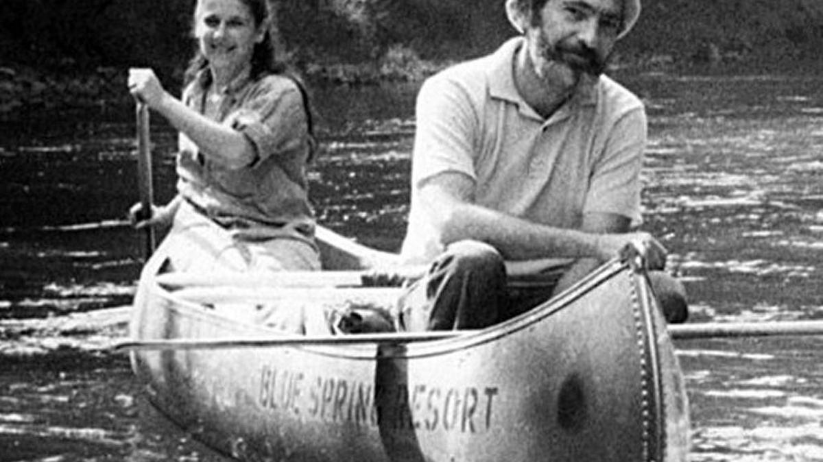 Harry Green, the real estate broker who told The Star of the 1960s why racial turnover was occurring east of Troost avenue. Here he paddles Missouri's Niangua river with his wife, Judy.
