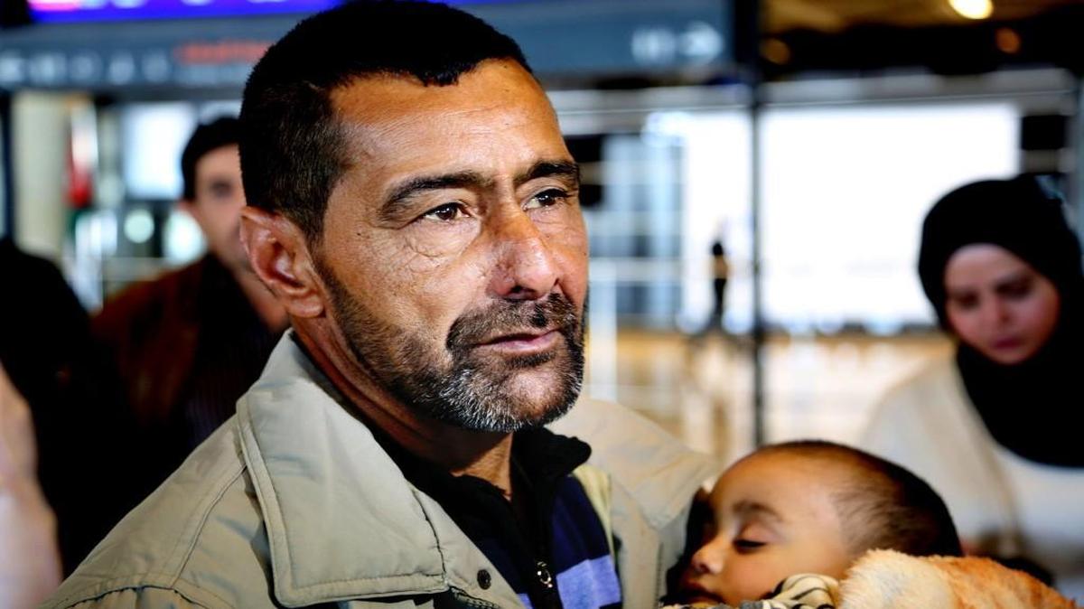 Syrian refugee Ahmad al-Abboud waited with his family earlier this month at the International Airport of Amman, Jordan. The first Syrian family to be resettled to the U.S. under its speeded-up “surge operation” departed to the United States from the Jordanian capital, Amman. Al-Abboud, who is being resettled with his wife and five children, said that although he is thankful to Jordan “where he has lived for three years after fleeing Syria's civil war” he is hopeful of finding a better life in the U.S.