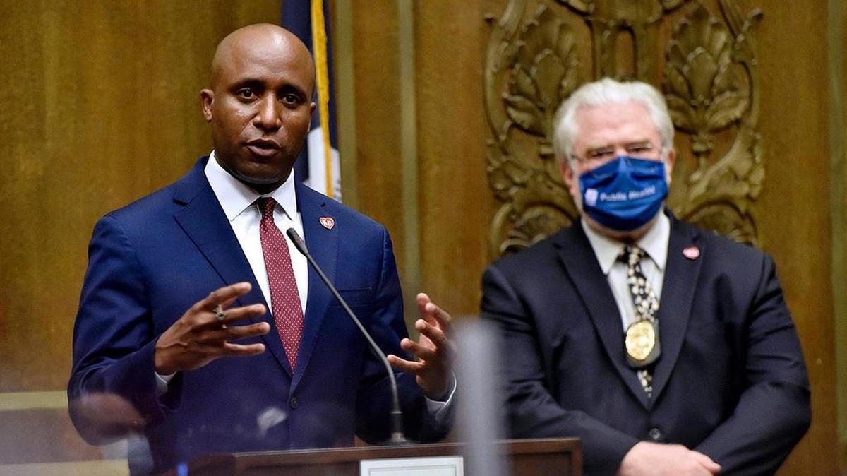 Mayor Quinton Lucas, left, and Health Department Director Rex Archer on Tuesday, July 21, 2020, inside city council chambers.
