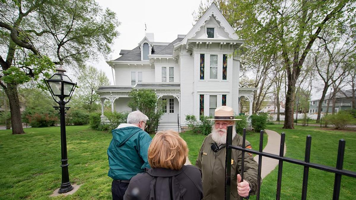 U.S. National Park Service Park Ranger Norton Canfield, right, leads a tour of Harry S. Truman’s home at the Harry S. Truman National Historical Site in this 2013 file photo.