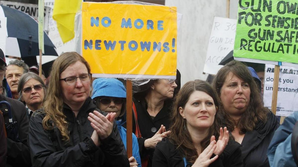 Gun control supporters joined together for an Oregon Alliance to Prevent Gun Violence Day of Action rally at the Capitol steps in Salem, Ore.