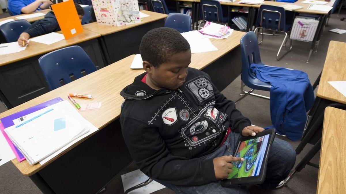 Jordan Fantroy, 10, worked on an iPad while in his fifth-grade class at Fairview Elementary, a Kansas Challenge School award winner, in Olathe. The Challenge Award recognizes schools for outstanding achievement and uncommon accomplishments based on Kansas Assessment results, the sample size and the socioeconomic status of those taking the test.