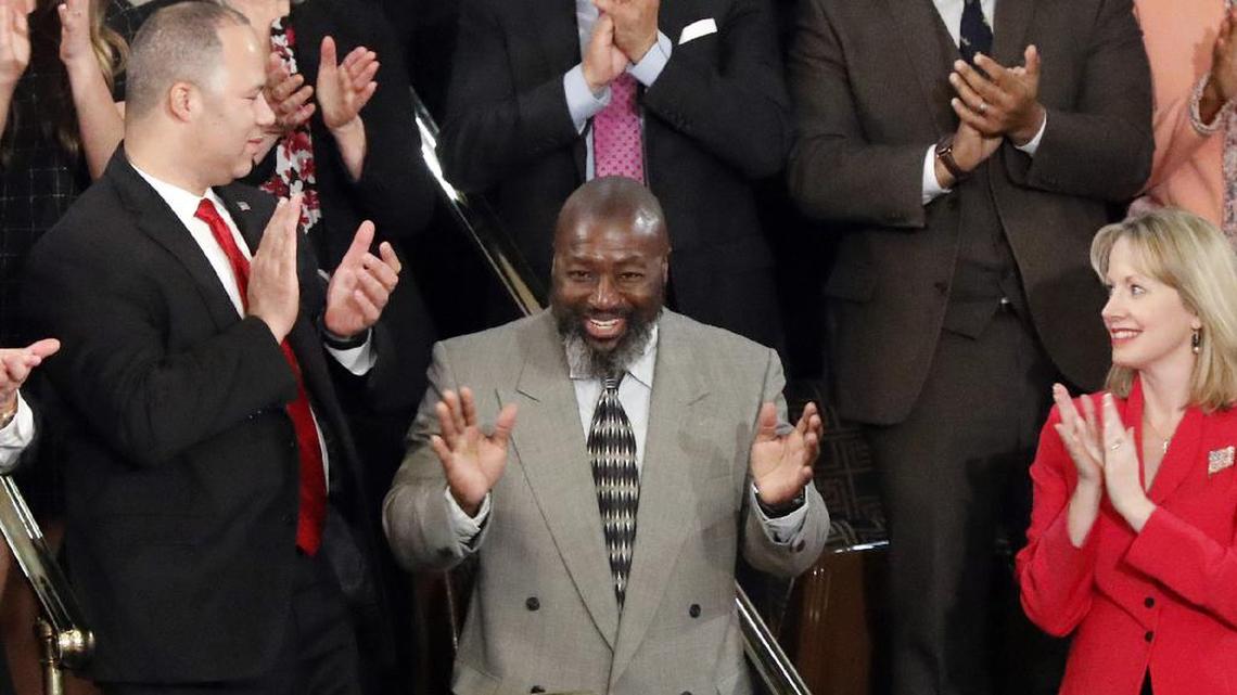 Matthew Charles, center, gestures as President Donald Trump acknowledges him during the 2019 State of the Union address. He will join Kansas City Mayor Quinton Lucas for a Nov. 12 event about criminal justice reform.