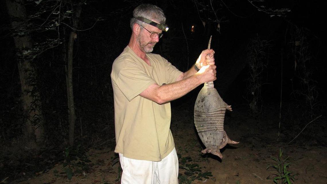 In this 2009 photo, Lynn Robbins, a biology professor at Missouri State University, had a close encounter with an armadillo — unthinkable not so long ago.