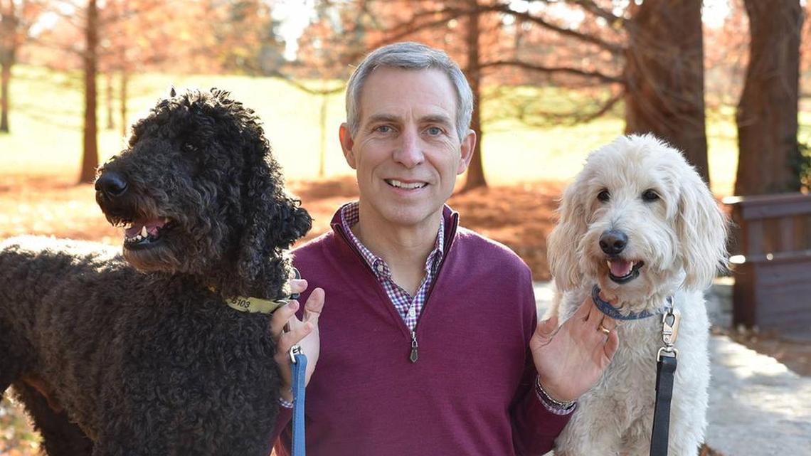 Kansas City mayoral candidate Steve Miller with his dogs Charlie and Max