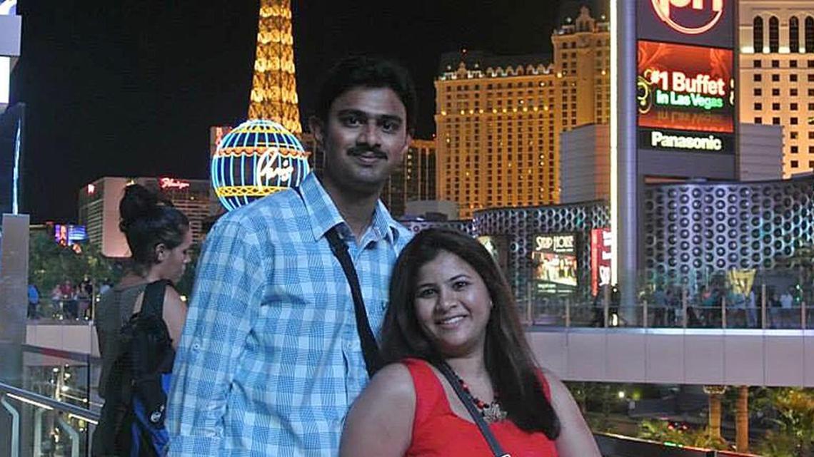 In this undated photo provided by Kranti Shalia, Srinivas Kuchibhotla, left, poses for photo with his wife Sunayana Dumala in Las Vegas.