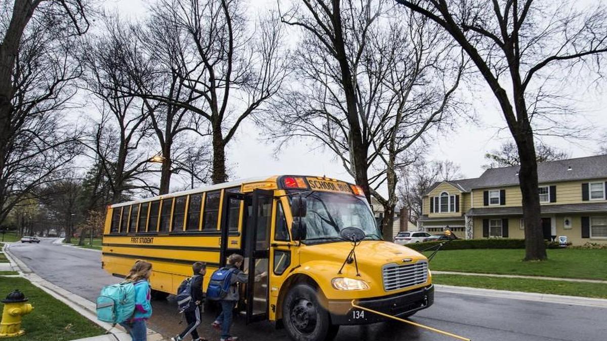 Children earlier this year boarded a school bus in Johnson County. Parents in many Johnson County communities are worried about the future of their schools, which they say are under attack by the Kansas Legislature. Lawmakers are meeting in Topeka in a special session to try to fix the school funding formula.