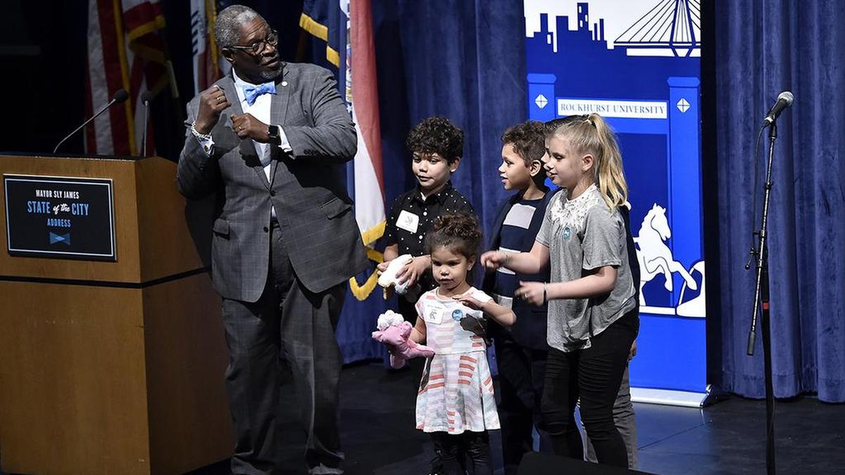 Kansas City Mayor Sly James delivered his final State of the City address at Rockhurst University on Tuesday. At the end of his speech, James brought onstage his grandchildren, a niece and his nephews.