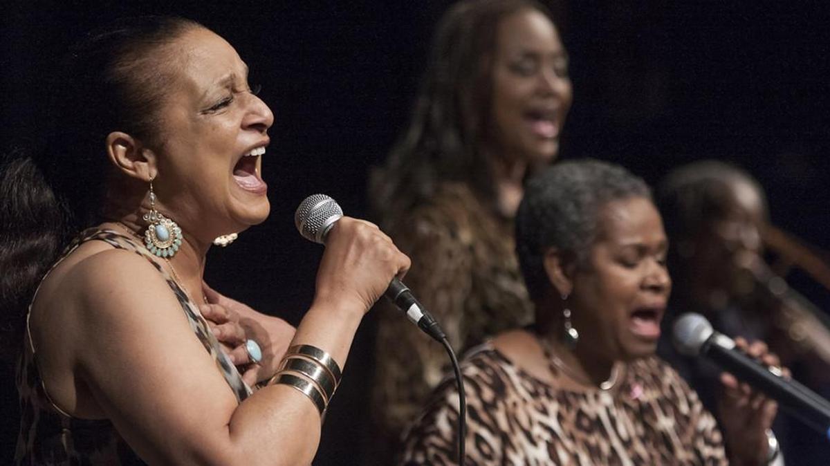 Nedra Dixon, (left) Pamela Baskin-Watson (front right) and Angela Hagenback, of Book of Gaia, performed on the Gem Theater stage at Kansas City's 18th & Vine Jazz and Blues Festival Saturday afternoon, October 11, 2014.
