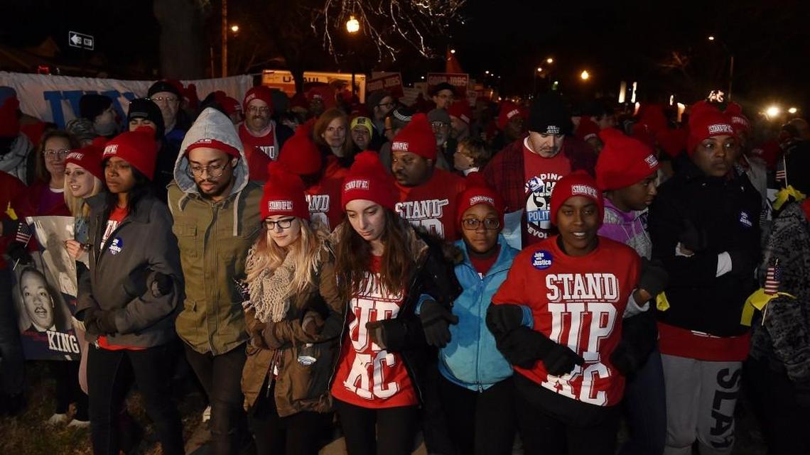 Protesters at The Paseo and 63rd Street joined hundreds of workers from the fast-food, child and elder care, education and other low-wage industries who participated in Fight for $15 rallies Tuesday, Nov. 29, 2016 in more than 300 cities across the country.