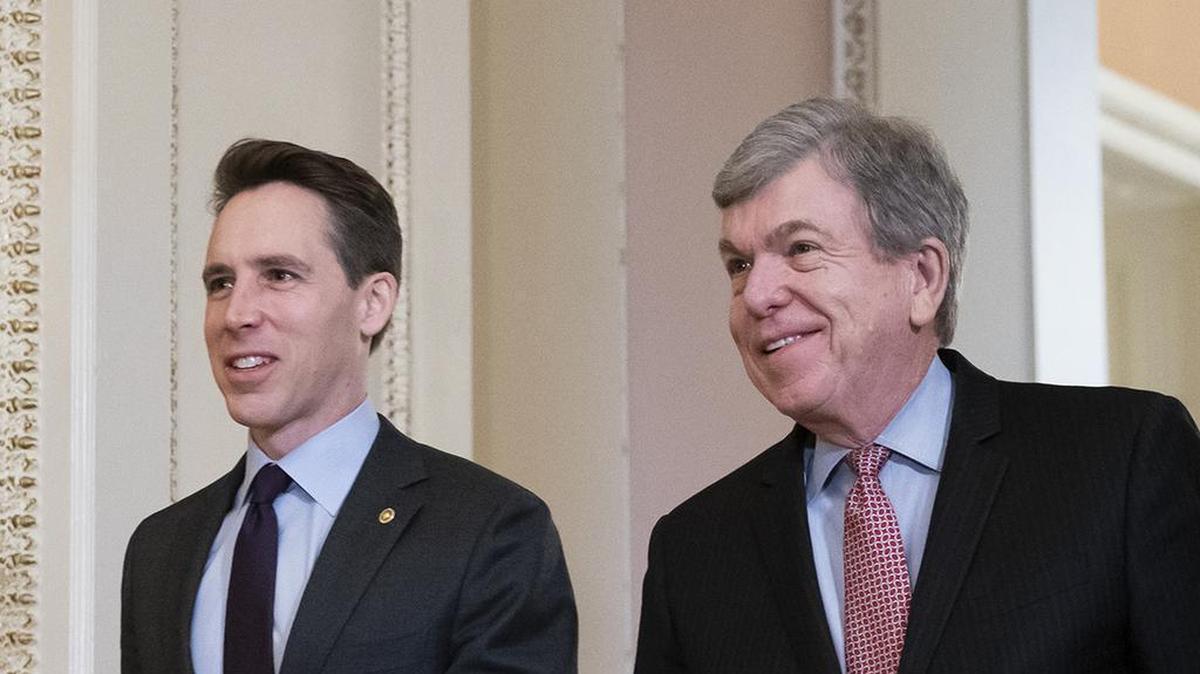 Sen. Josh Hawley, R-Mo., left, and Sen. Roy Blunt, R-Mo., arrive as defense arguments by the Republicans resume in the impeachment trial of President Donald Trump on charges of abuse of power and obstruction of Congress, at the Capitol in Washington, Monday, Jan. 27, 2020. (AP Photo/J. Scott Applewhite)