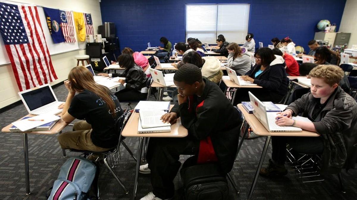 Students are hard at work at Sumner Academy of Arts and Science in Kansas City, Kan. Gov. Sam Brownback is calling for new solutions to funding public education in the state.