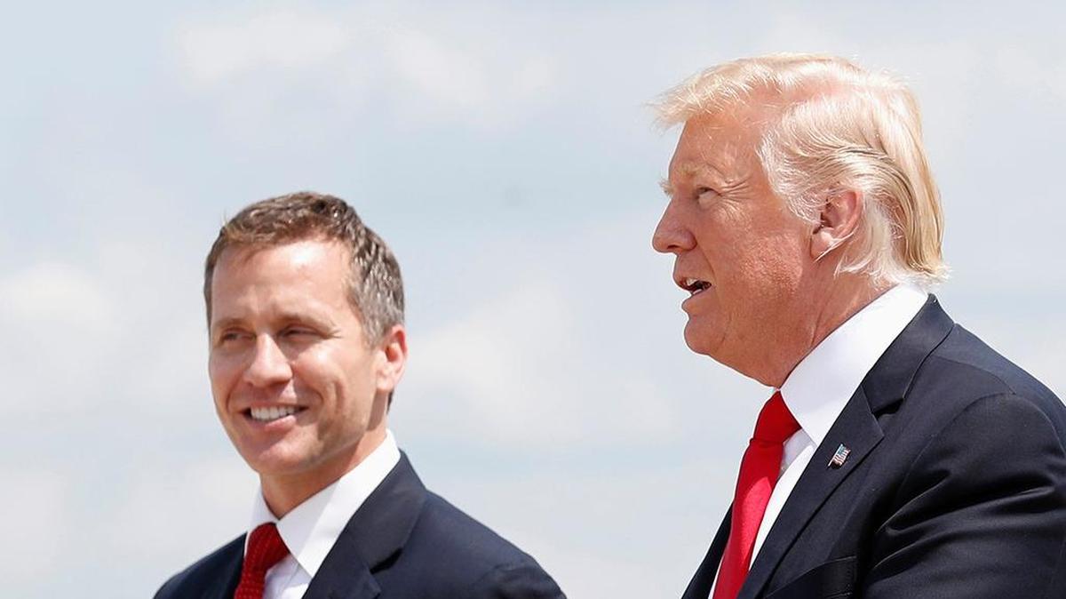 Former President Donald Trump and former Missouri Gov. Eric Greitens in a 2018 file photo.