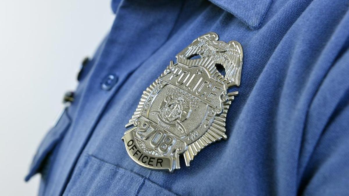 The Kansas City Police Department is celebrating its 140th anniversary with replica sunburst design badges that were worn from about 1923 to roughly 1932. Nearly 400 law enforcement and civilian employees are able to purchase the badges as a fundraiser for the police historical society. The badges will be active throughout 2014, so they will not be available to the public until they become inactive in 2015. Officer Ryan Taylor wears the silver officer design of the replica badge at the police annex Monday, Jan. 13, 2013.