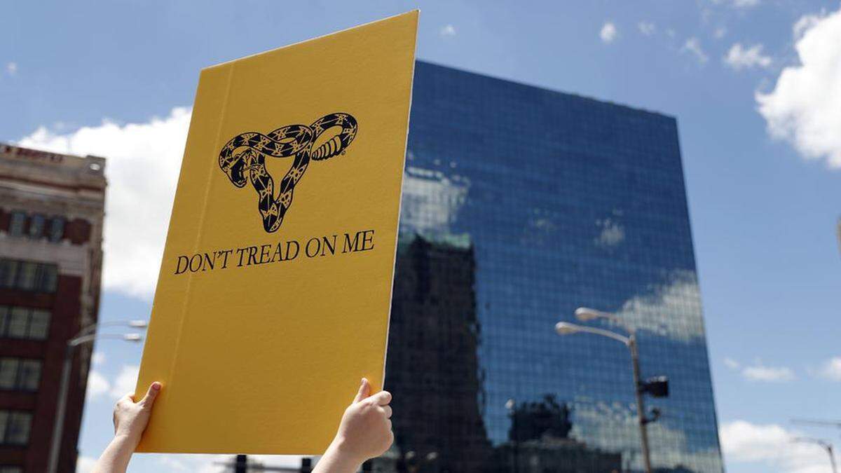 Abortion-rights supporters take part in a protest Thursday, May 30, 2019, in St. Louis. A St. Louis judge heard an hour of arguments Thursday on Planned Parenthood’s request for a temporary restraining order that would prohibit the state from allowing the license for Missouri’s only abortion clinic to lapse at midnight Friday. (AP Photo/Jeff Roberson)